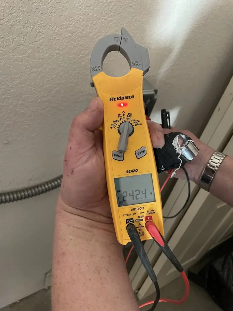 Voltage testing with clamp meter during Circuit Breaker Repair in Tuckahoe